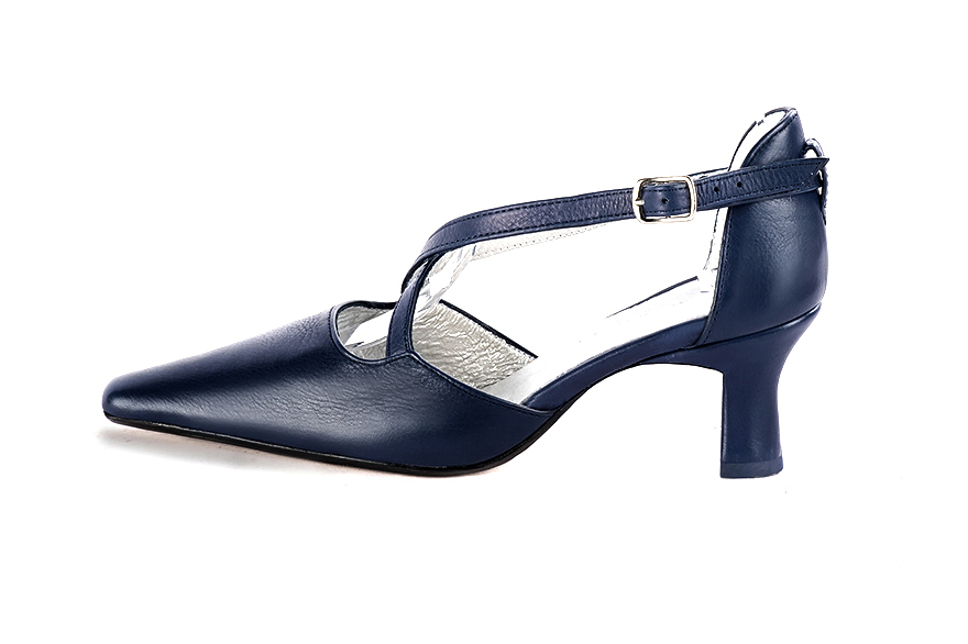 Women's navy blue open side dress shoes, with crossed straps. Tapered toe. Medium spool heels - Profile view